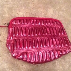 Metallic pink clutch